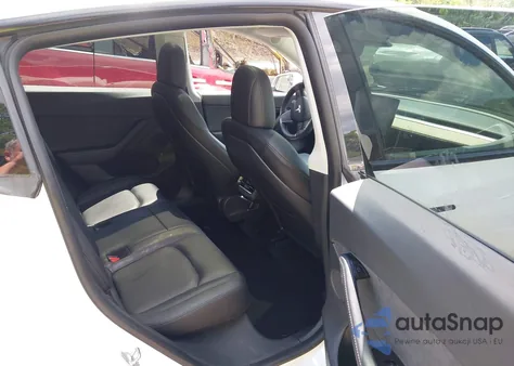 2021 Tesla Model Y Standard Range Rear-Wheel Drive from USA, damaged, VIN 5YJYGDEDXMF109655